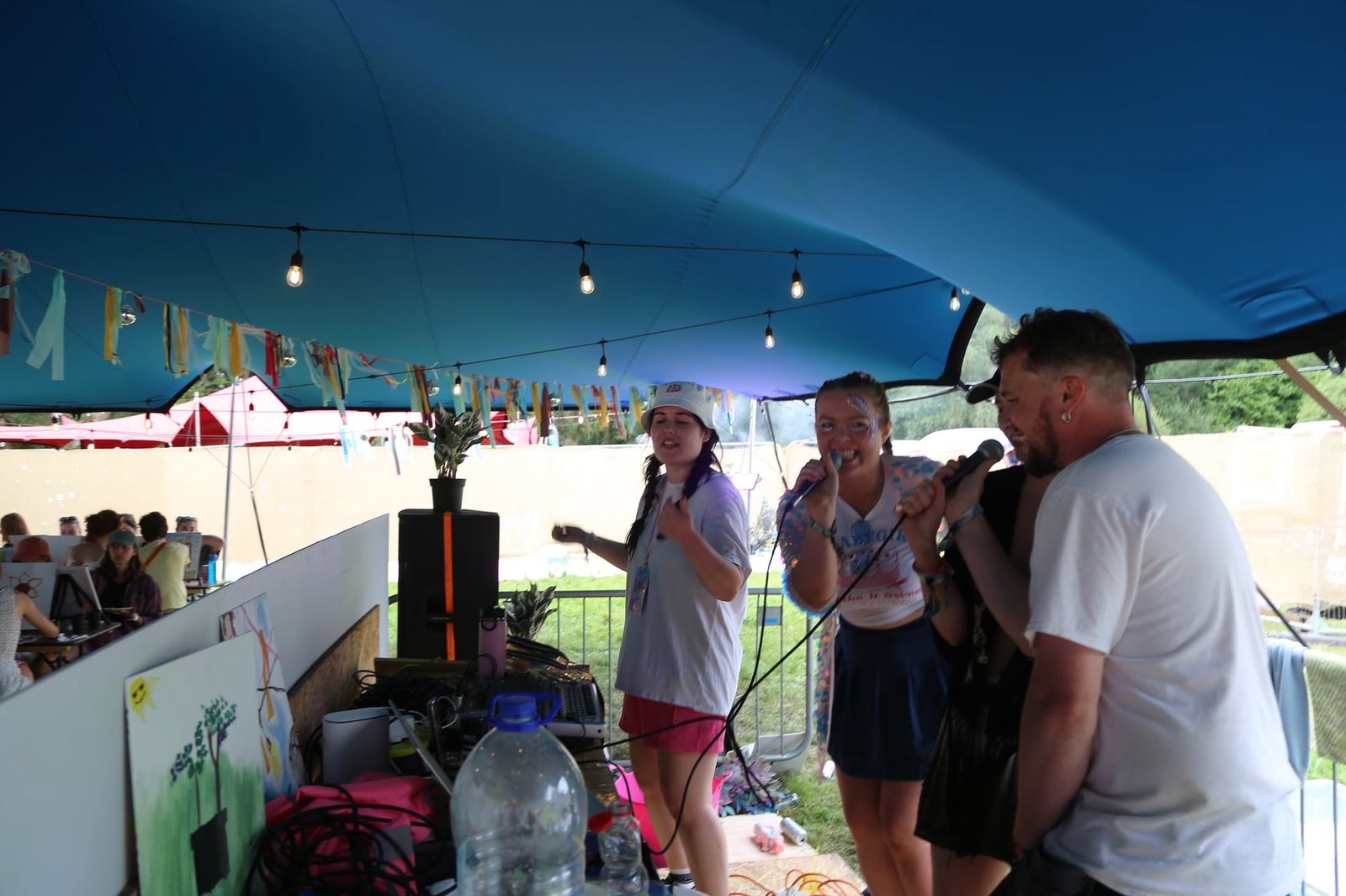 Friends enjoying a group karaoke event